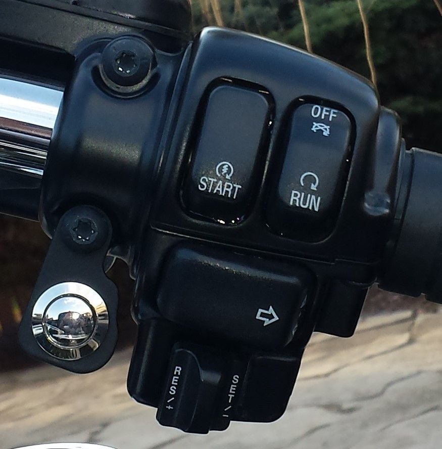 Remote garage door opener for motorcycles